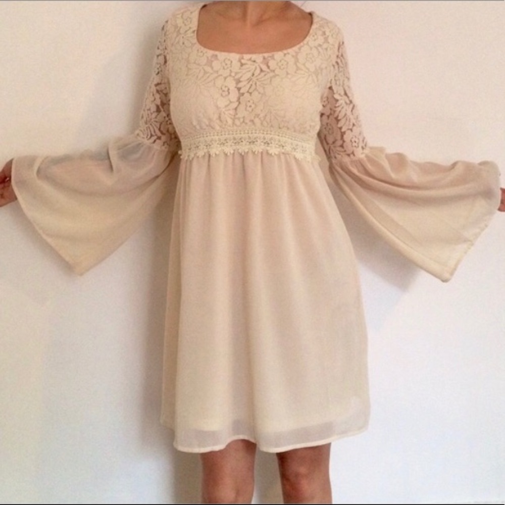 Cream colored bell sleeved flowy dress NWT